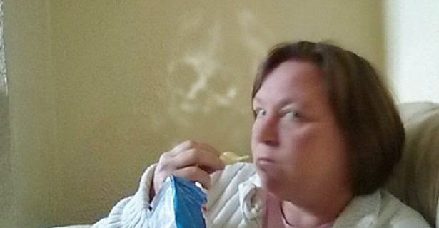 Spooky Face Appears in Photo of Woman at Home
